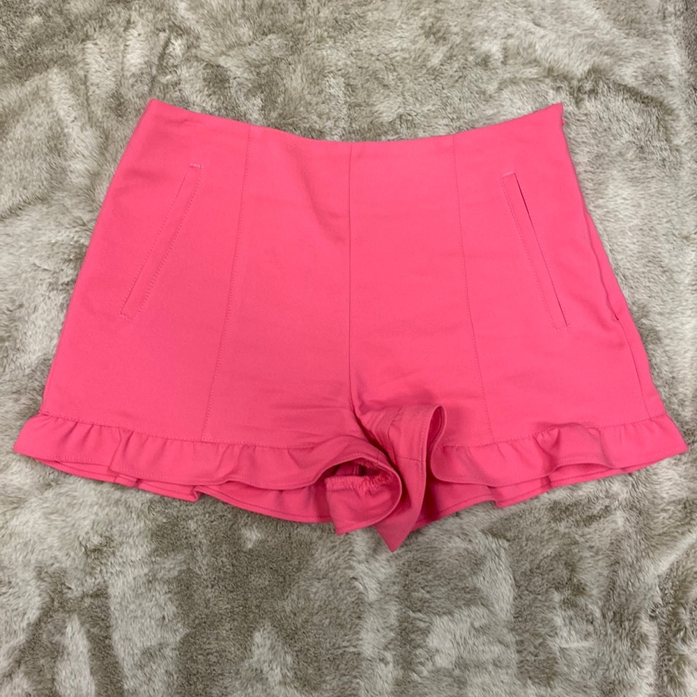 1. State adorable pink ruffle bottom shorts